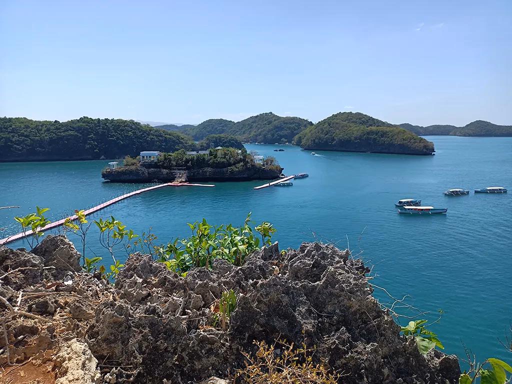 A view from atop a small hill overlooking Hundred Islands National Park, Alaminos, Pangasinan, Philippines.