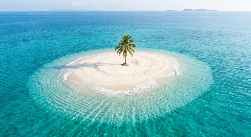 Sunken cemetery white cross above water volcanic island Camiguin Philippines
